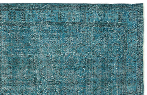 Load image 1 in gallery view. Teal and dark blue distressed rug with a traditional ornate border and faded floral medallion pattern.