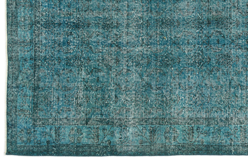 Load image 1 in gallery view. Teal and dark blue distressed rug with a faded traditional medallion pattern and a bordered edge.