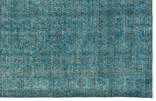 Load image 1 in gallery view. Teal and dark blue distressed rug with a faded traditional medallion pattern.
