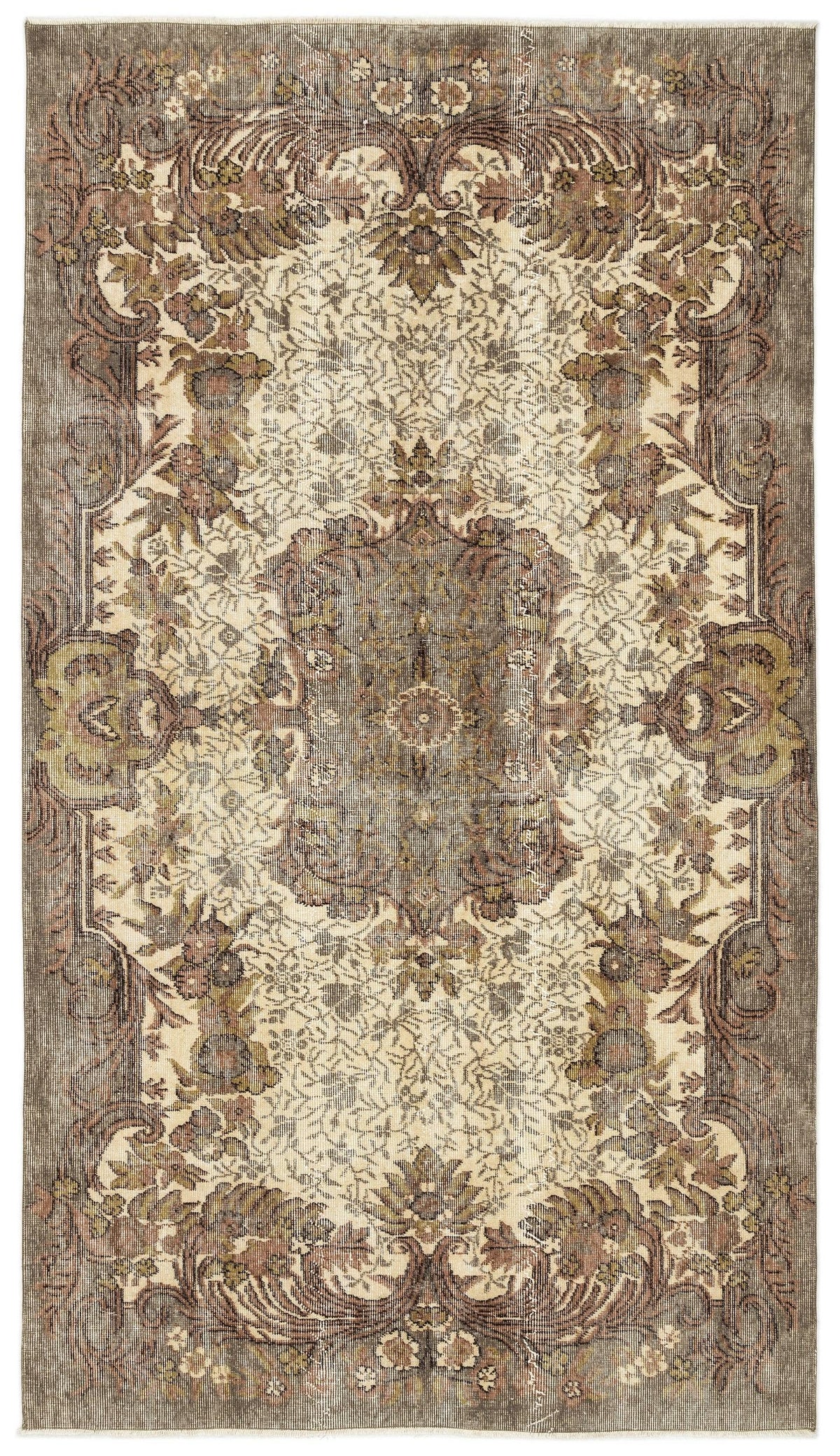 Distressed brown, olive, and cream rug with a traditional floral medallion pattern and ornate border.