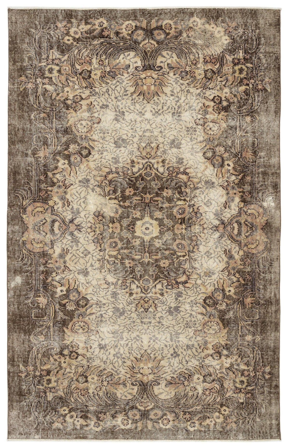 Distressed brown and cream traditional rug with a central floral medallion and ornate border.