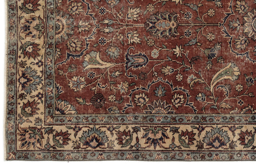 Load image 1 in gallery view. Rust-red traditional rug with intricate floral and vine motifs, featuring a beige and blue decorative border.