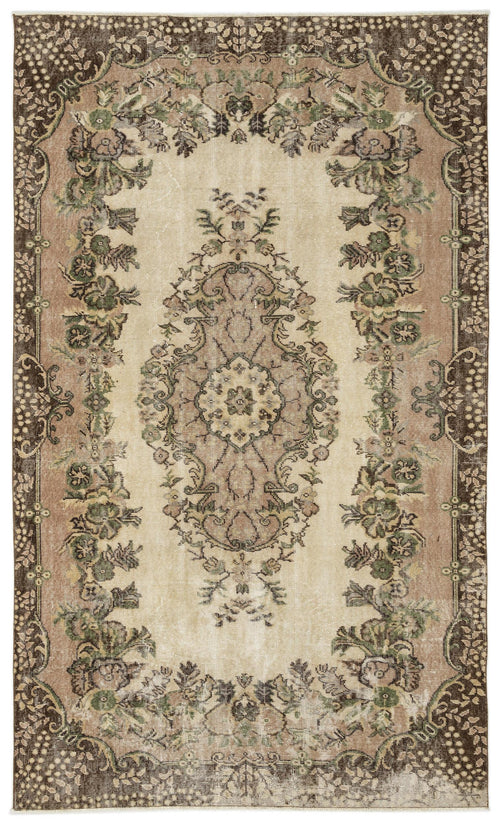 Load image 1 in gallery view. Beige, brown, and sage green traditional rug with a central floral medallion and ornate botanical border.