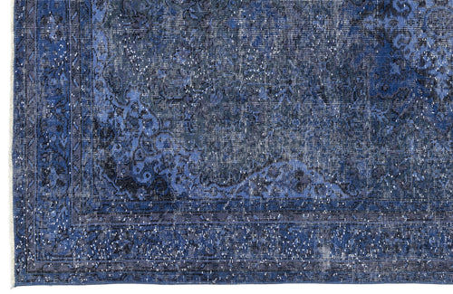Load image 1 in gallery view. Deep blue and charcoal distressed rug with a traditional ornate medallion pattern and a detailed border.