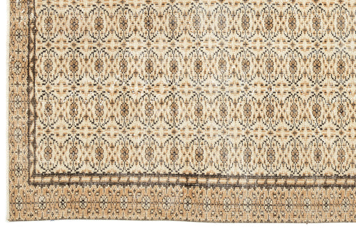 Load image 1 in gallery view. Beige and brown rug with a repeating geometric diamond and floral medallion pattern and a dark border.