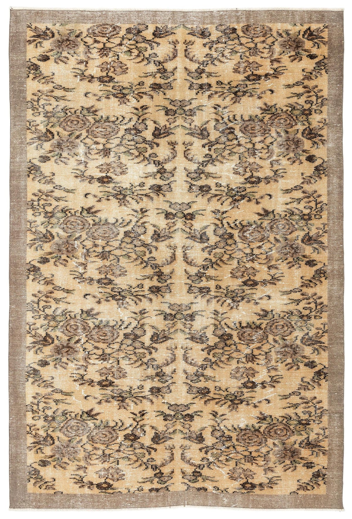 Tan and brown distressed rug with a repeating floral medallion pattern and a solid border on a white background.