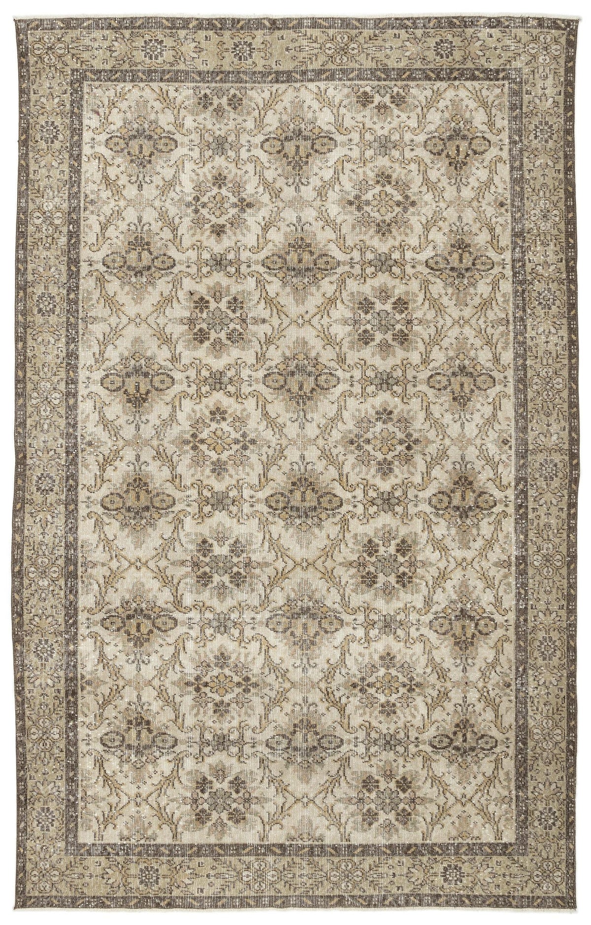 The Sadeane Vintage Floral Rug (6'0 x 9'8) features a detailed beige, brown, and gray floral vine pattern with an ornate geometric floral border, reflecting classic Anatolian design.
