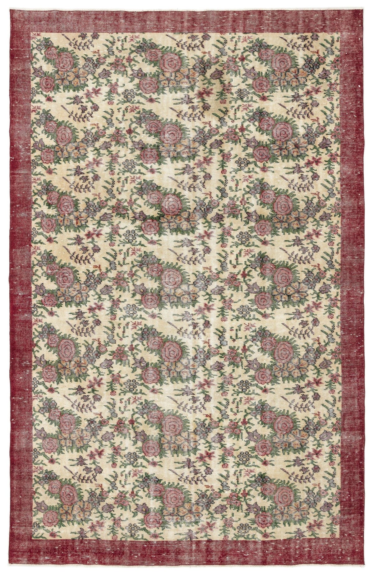 Cream rug with a distressed floral pattern in red and green, featuring a solid red border.