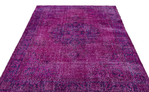 Load image 1 in gallery view. Magenta and deep purple distressed vintage-style rug with a central medallion pattern on a white background.