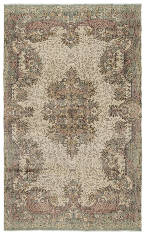Load image 1 in gallery view. Beige, sage green, and dusty rose traditional rug with a central floral medallion and ornate border pattern.