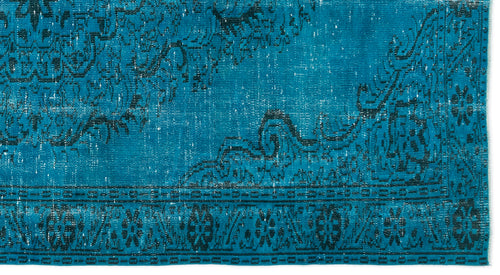 Load image 1 in gallery view. Teal and black distressed rug with a traditional ornate floral medallion pattern and a geometric border.