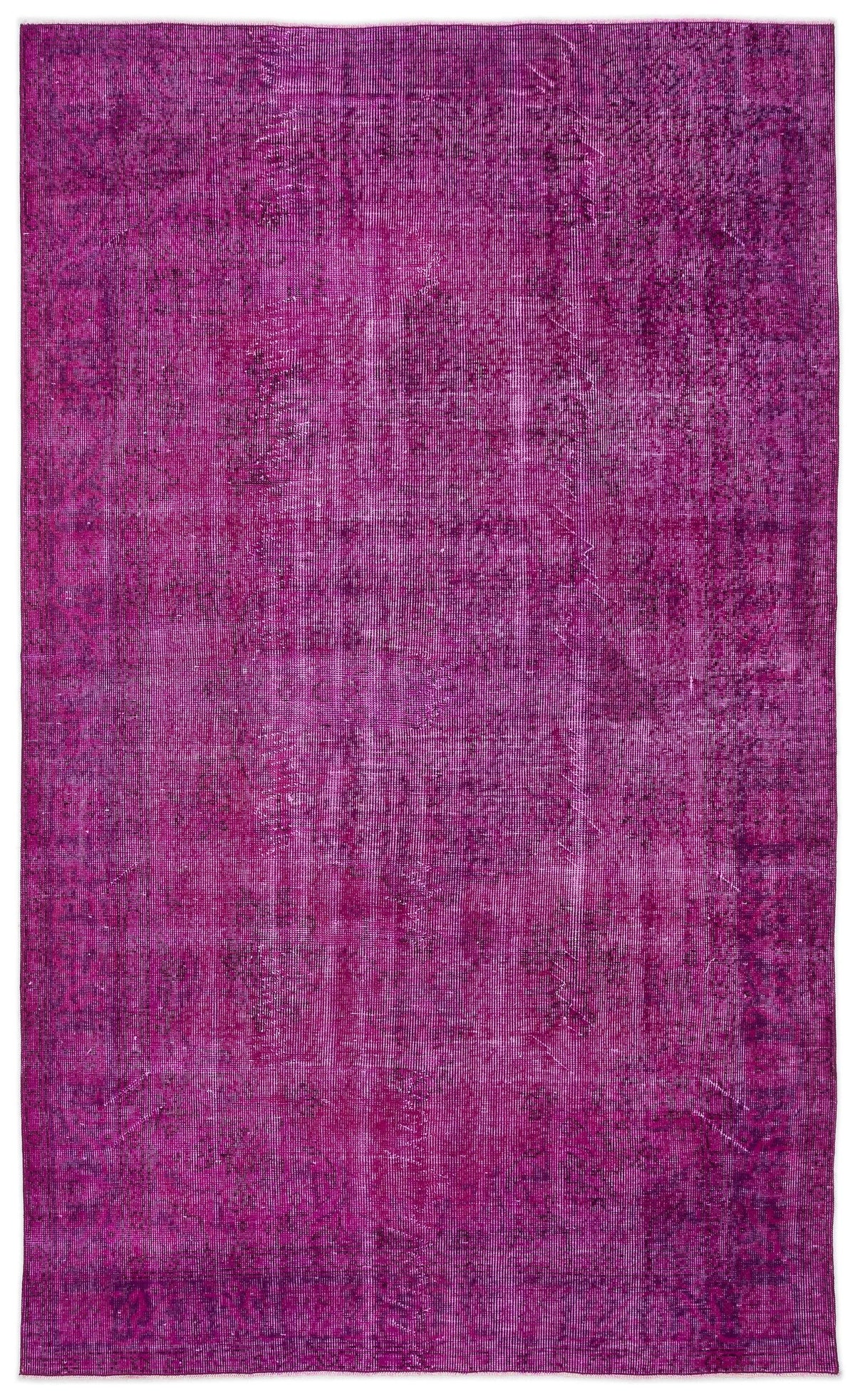 Magenta overdyed vintage rug with a distressed, faded traditional pattern on a white background.