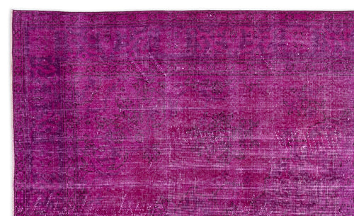 Load image 1 in gallery view. Magenta overdyed vintage rug with a faint, distressed traditional medallion pattern.