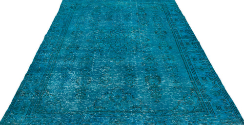 Load image 1 in gallery view. Teal distressed area rug with a faded traditional medallion pattern and a bordered edge on a white background.