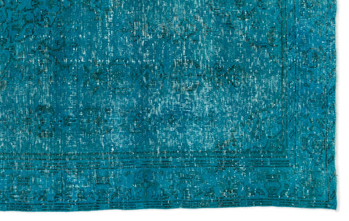 Load image 1 in gallery view. Teal distressed rug with a faded traditional medallion pattern and a bordered edge.