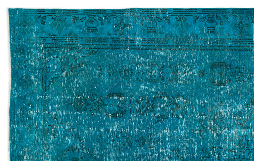 Load image 1 in gallery view. Teal distressed rug with a faded traditional border and central medallion pattern.
