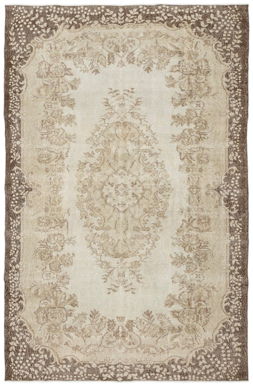 Load image 1 in gallery view. The Pririna - Vintage Medallion Rug (6'2" x 9'7") features a central floral medallion and intricate border in beige and brown, offering a worn, antique look for timeless charm.