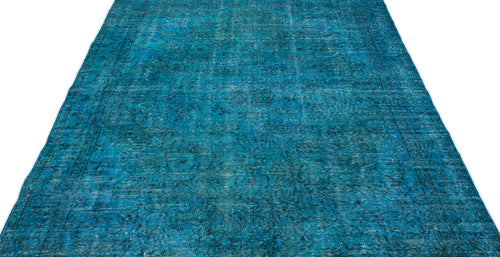 Load image 1 in gallery view. Teal distressed rug with a faded traditional floral medallion pattern on a white background.