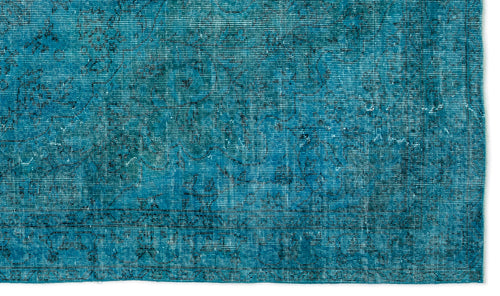 Load image 1 in gallery view. Teal distressed rug with a faded traditional medallion pattern and a linear border.