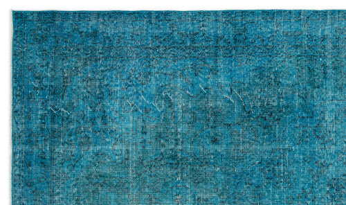 Load image 1 in gallery view. Teal vintage-style rug with a distressed, faded traditional floral medallion pattern and a thin border.