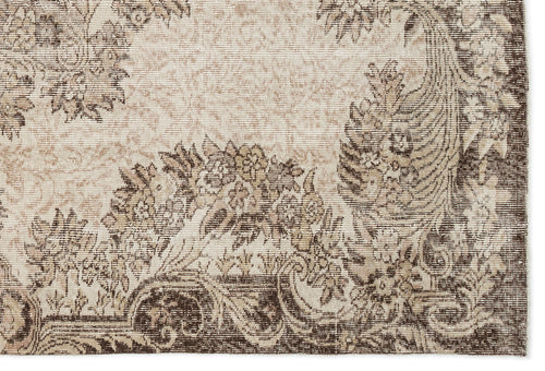 Load image 1 in gallery view. Beige and dark brown rug with a distressed traditional floral medallion pattern.