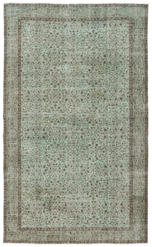 Load image 1 in gallery view. Sage green and brown distressed vintage-style rug with an intricate floral medallion pattern and a wide border.