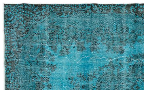Load image 1 in gallery view. Teal and black distressed rug with a traditional floral medallion pattern.