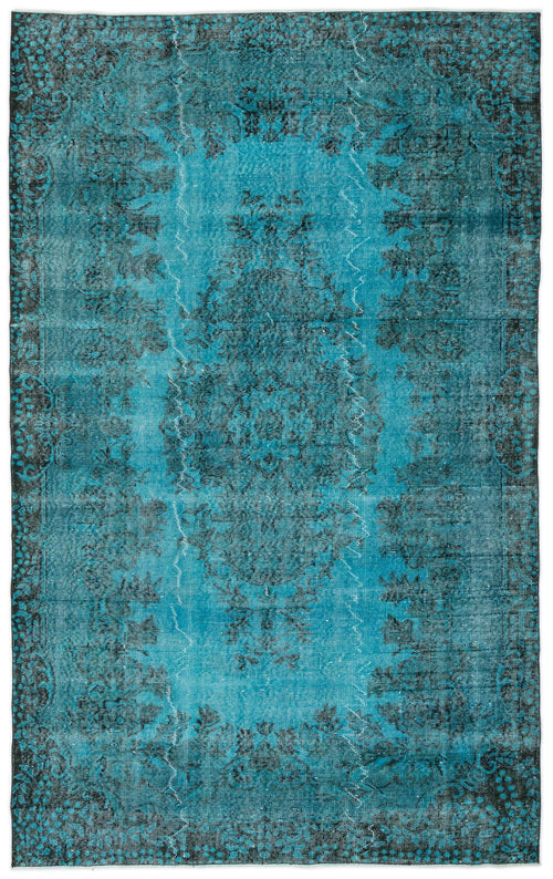 Load image 1 in gallery view. Teal and black distressed rug with a traditional central medallion and ornate floral border.