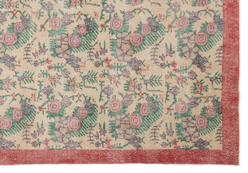 Load image 1 in gallery view. Beige rug with a floral pattern in pink, green, and blue, featuring a solid red border.