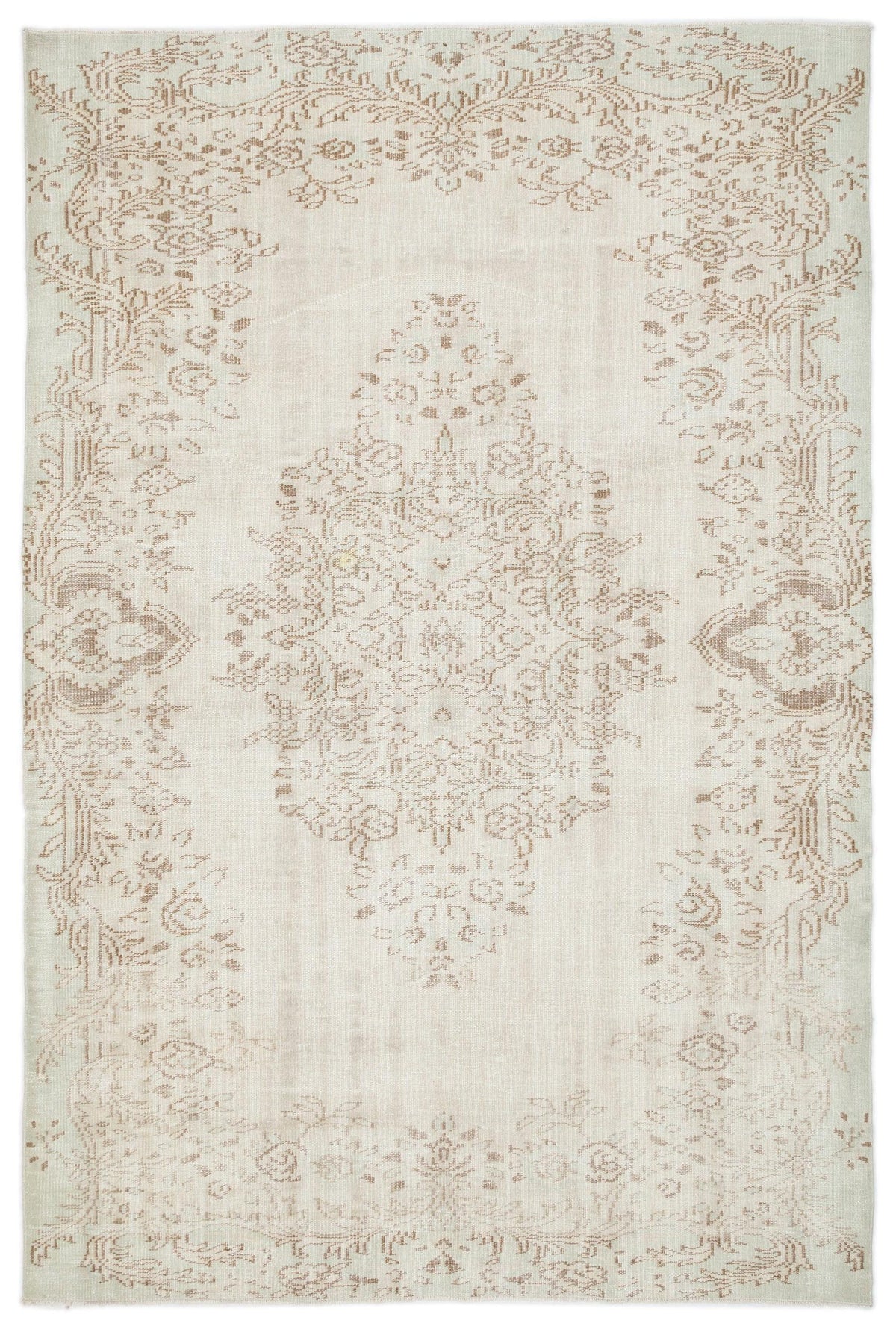 Off-white rug with a faded beige floral medallion and intricate border pattern.