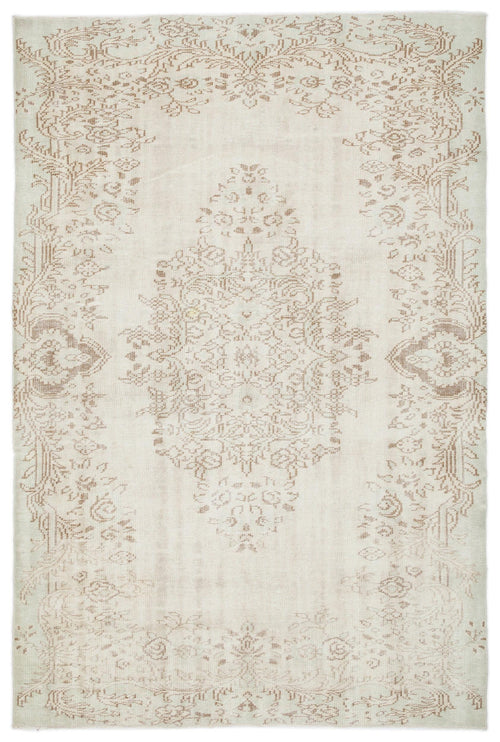 Load image 1 in gallery view. Off-white rug with a faded beige floral medallion and intricate border pattern.