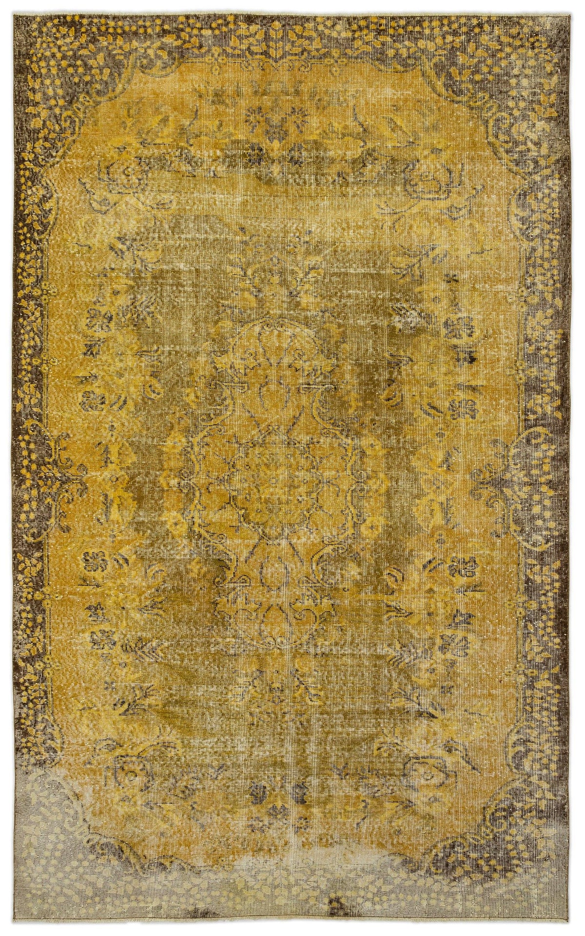 Mustard yellow and dark brown distressed traditional rug with a central floral medallion and ornate border.