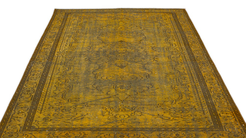 Load image 1 in gallery view. Distressed mustard yellow and charcoal grey traditional rug with a faded central medallion and ornate border.