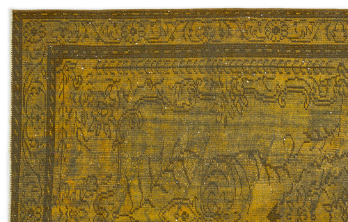 Load image 1 in gallery view. Mustard yellow and dark brown rug with a distressed traditional floral border and central medallion pattern.