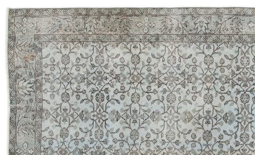 Load image 1 in gallery view. Light blue and grey vintage-style rug with a distressed floral medallion pattern and a detailed border.