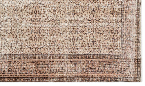 Load image 1 in gallery view. Beige and brown vintage-style rug with a distressed floral medallion pattern and a wide decorative border.