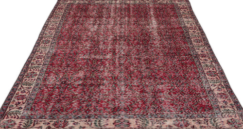Load image 1 in gallery view. Distressed red and cream traditional rug with an intricate floral medallion pattern and a wide decorative border.