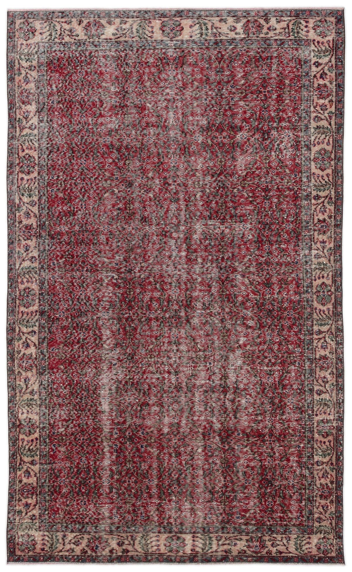 Distressed red and charcoal traditional rug with a floral border and faded central medallion pattern.