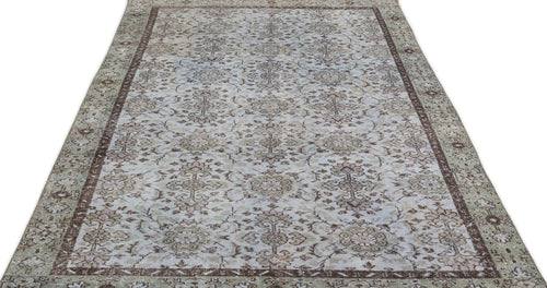 Load image 1 in gallery view. Light blue and brown vintage-style rug with a distressed floral medallion pattern and a wide decorative border.