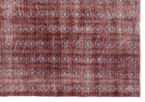 Load image 1 in gallery view. Red and blue distressed rug with a repeating geometric diamond and medallion pattern on a white background.