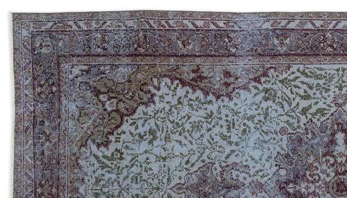 Load image 1 in gallery view. Distressed vintage-style rug in muted burgundy, olive green, and grey with an intricate floral border and central pattern.