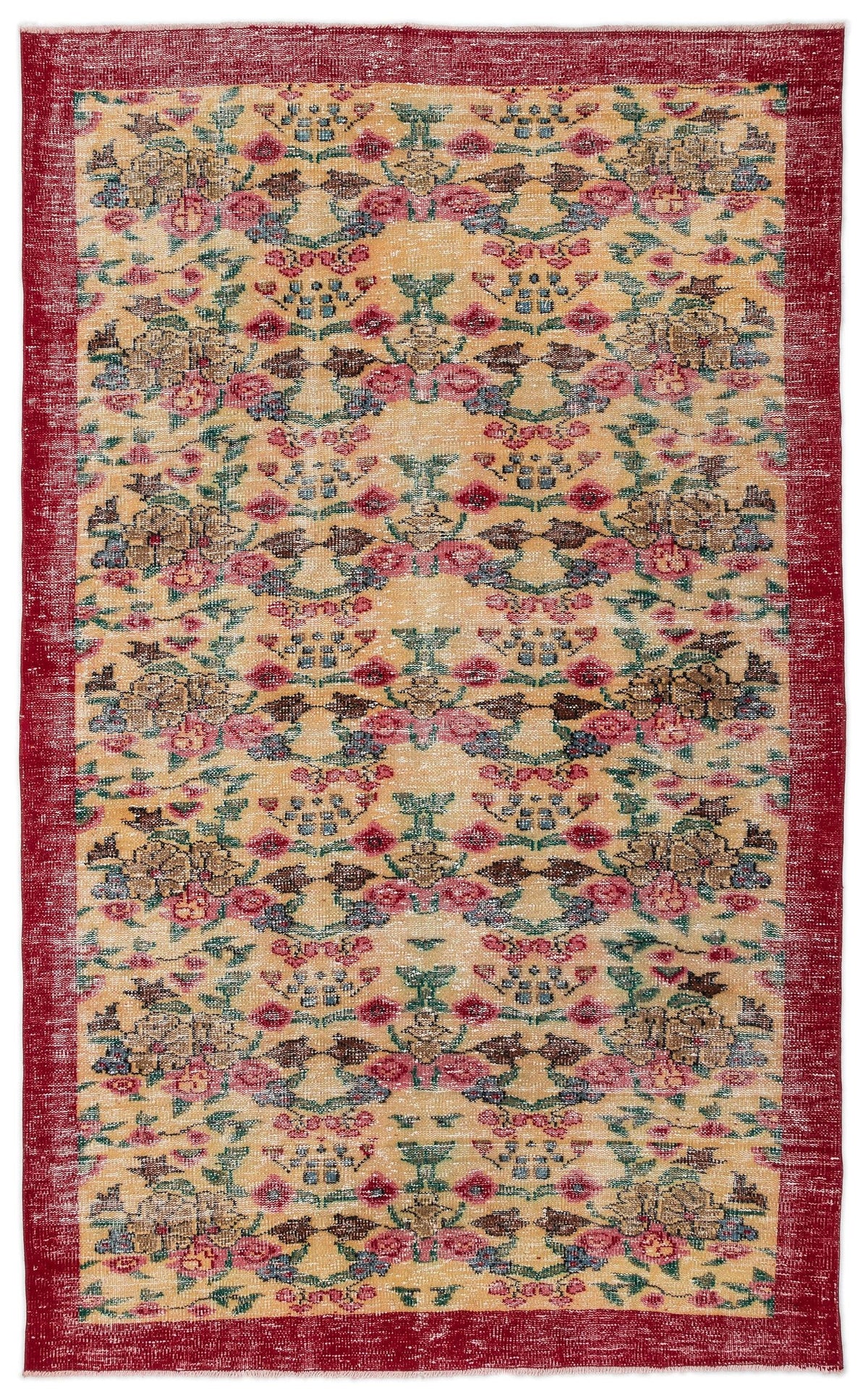 Distressed gold rug with a red border and repeating floral medallion pattern in pink, green, and brown.