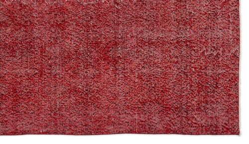 Load image 1 in gallery view. Deep red rug with a subtle, distressed geometric diamond pattern and a white fringe edge.