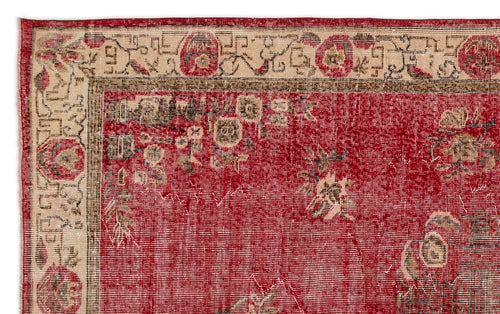 Load image 1 in gallery view. Red and beige vintage-style rug with a distressed floral medallion pattern and a decorative border.