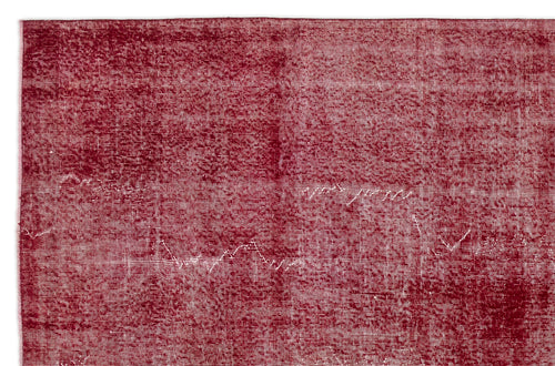 Load image 1 in gallery view. Deep red rug with a distressed, weathered texture and visible white horizontal weave details.