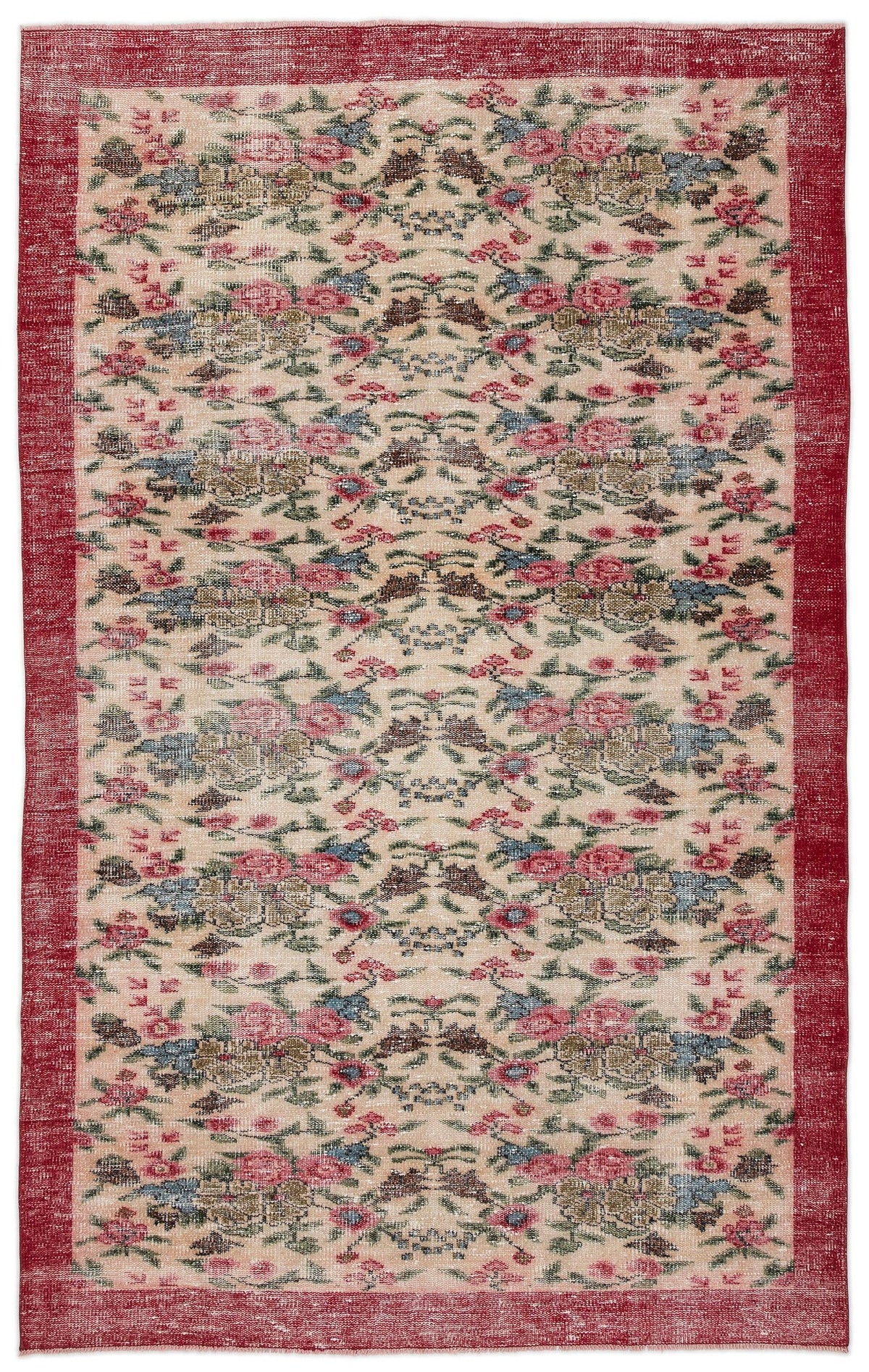 Distressed beige rug with a red border and a repeating floral pattern in shades of red, blue, and olive green.