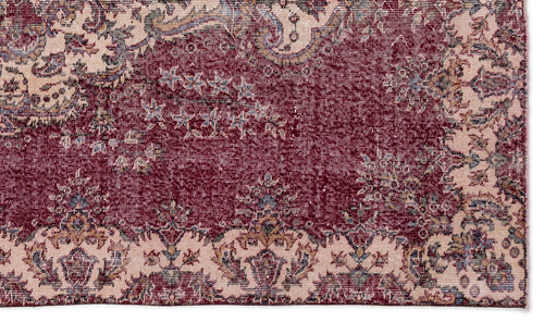 Load image 1 in gallery view. Deep red and cream traditional rug with a distressed floral medallion pattern and intricate border details.