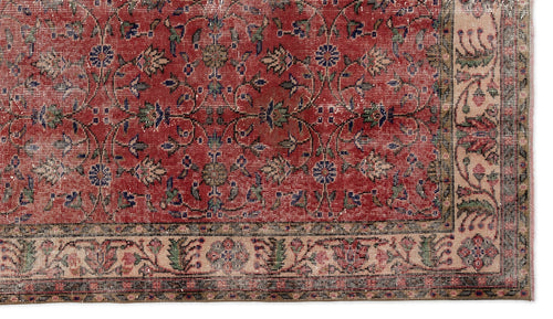 Load image 1 in gallery view. Red traditional rug with a floral vine pattern and a beige decorative border.