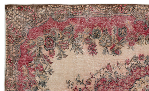 Load image 1 in gallery view. Distressed vintage-style rug with a red and beige floral medallion pattern and a dark brown border.