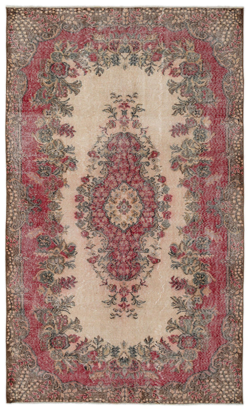 Load image 1 in gallery view. Distressed beige and red vintage-style rug with a central floral medallion and ornate border.